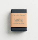 Tallopharm Lather Barrier Bar with Charcoal & TeaTree on a light gray background