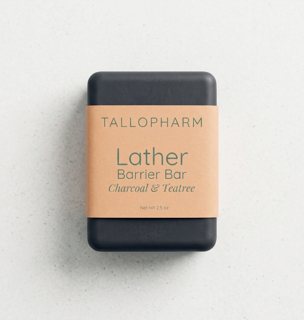 Tallopharm Lather Barrier Bar with Charcoal & TeaTree on a light gray background