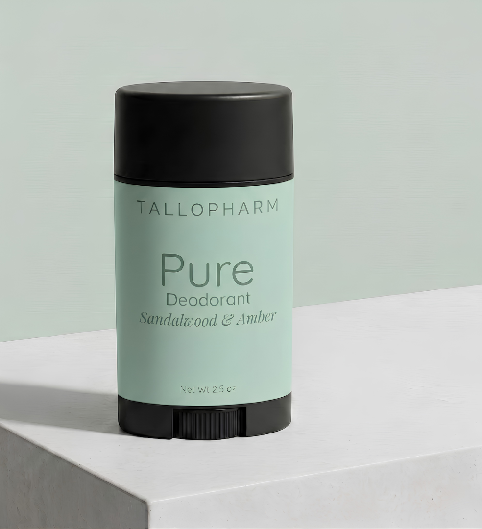 Tallopharm Deodorant on a light gray background - Sandalwood and Amber.