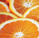 Close-up of sliced oranges with a focus on their juicy interior.